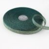 shimmering open weave fabric strip emerald gold